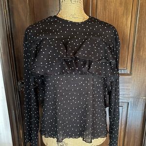 Black Blouse w/white polka dots.